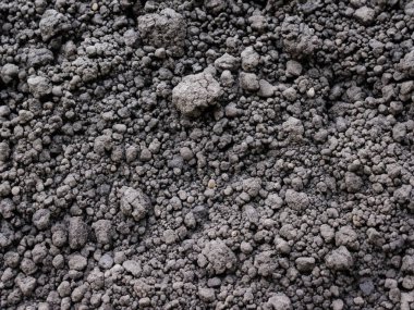 Kara toprak arka planı. Toprağın dokusu.