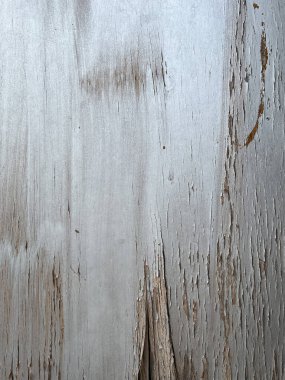 Eski gri ahşap arka planda boyası soyulmuş
