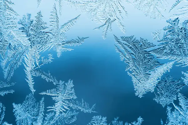 ガラス上の抽象的な霜のパターン 背景テクスチャ ロイヤリティフリーのストック写真
