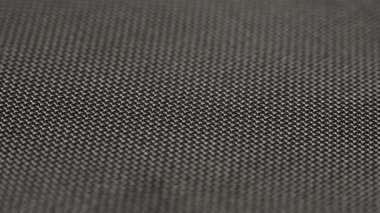 Çemberde dönen metal tel örgüsü. Soyut arkaplan dokusu makrosu