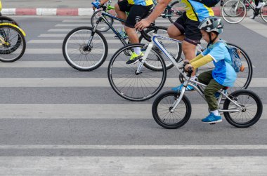 Chon Buri, Thailand - December 9, 2018: Many people with bikes are enjoy in a biking event Bike for Dad clipart