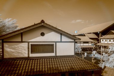 Infrared photography, a building with a tiled roof and a distinctive architectural style, inspired by traditional East Asian design clipart