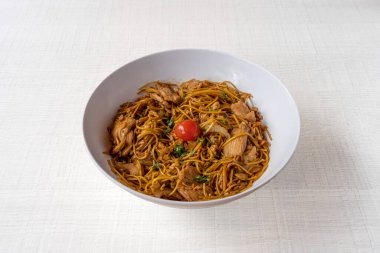 Thai dishe culinary Still Life. Thai noodles with chicken, vegetable accompaniement