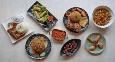 African and Thai culinary Still Life. Mix of African and Thai dishes top view