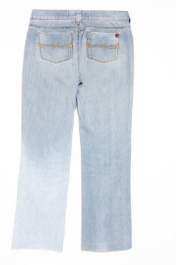 Durgun hayat. Stüdyo, bir kadının kot pantolonunun detaylarını çekti, düzleştirdi.