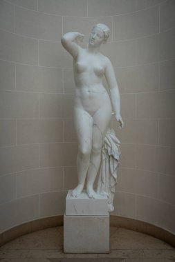 Paris, France - 05 10 2024: Bibliotheque Nationale de France Richelieu. View of a marble statue of a nude woman clipart
