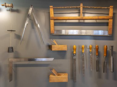 Paris, France - 05 11 2024: The Museum of Arts and Crafts. View of a stonemason's tools hanging