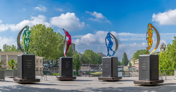 Paris, France - 05 25 2024: Olympic Games Paris 2024. View of The 4 cardinals of sport installation near Canal Saint-Martin and La Rotonde Stalingrad