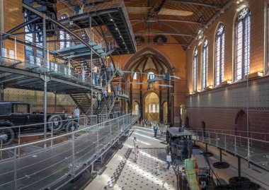 Paris, France - 05 11 2024: The Museum of Arts and Crafts. View of the nave in church of Saint-Martin-Des-Champs with old planes and cars clipart