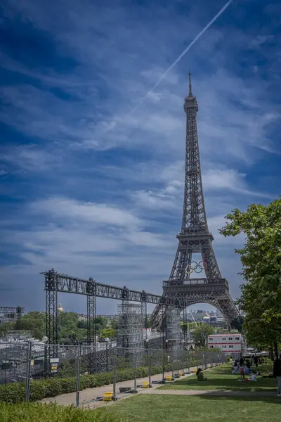 stock image Paris, France - 08 06 2026: View of the Eiffel Tower with the the rings of the Olympic games and Olympic Site of the Trocadero esplanade