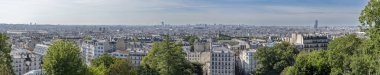 Paris, France - 07 14 2024: Montmartre district. Panoramic view of Paris from Sacre-Coeur square clipart