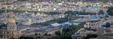 Paris, France - 07 22 2024: Olympic Games Paris 2024. View of the Olympic site facilities for Athletics, Road cycling, Archery along Esplanade des Invalides from Montparnasse Tower clipart