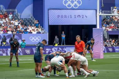 Paris, France - 07 24 2024: Olympic Games Paris 2024. View of the French rugby winner team playing in the stadium during the first day of The Olympic rugby tournament clipart