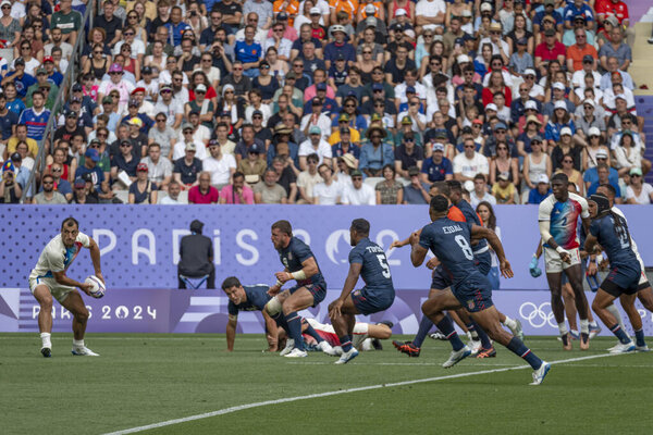 Paris, France - 07 24 2024: Olympic Games Paris 2024. View of the French rugby winner team playing in the stadium during the first day of The Olympic rugby tournament