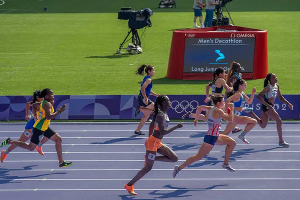 stock image Paris, France - 08 02 2024: Olympic Games Paris 2024. View of women's 100m qualification in the stadium during the first day of The Olympic Athletics events