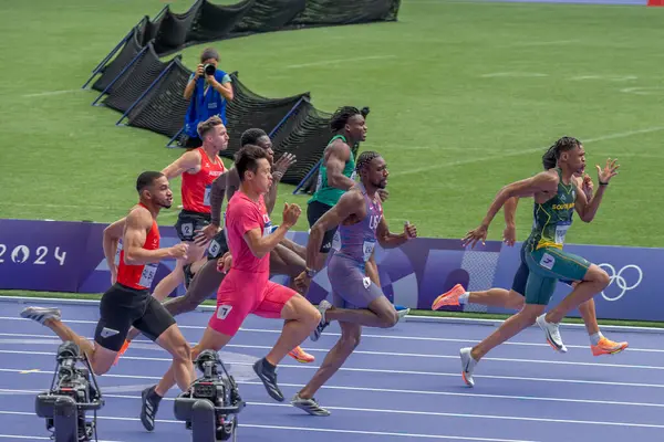 stock image Paris, France - 08 03 2024: Olympic Games Paris 2024. View of men's 100m in the stadium during preliminary round of The Olympic Athletics events