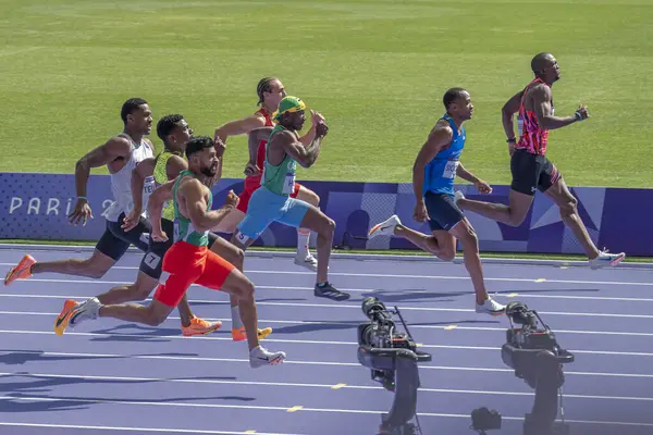 stock image Paris, France - 08 03 2024: Olympic Games Paris 2024. View of men's 100m in the stadium during preliminary round of The Olympic Athletics events