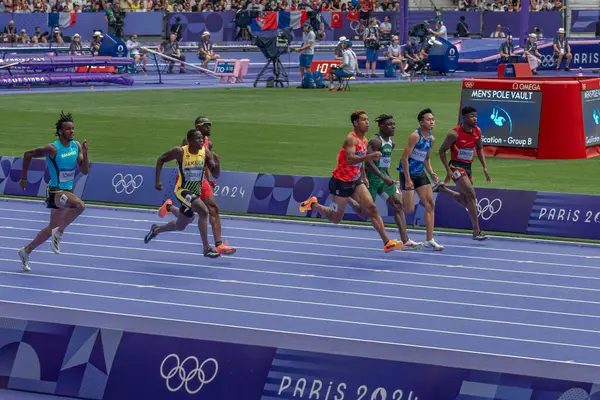 Stock image Paris, France - 08 03 2024: Olympic Games Paris 2024. View of men's 100m in the stadium during preliminary round of The Olympic Athletics events