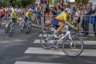 Paris, France - 08 04 2024: Olympic Games Paris 2024. View of women cyclists during The Olympic road cycling events clipart