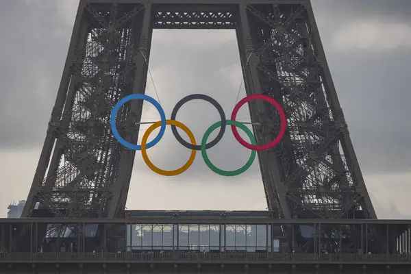 stock image Paris, France - 08 19 2024: Olympic Games Paris 2024. View of the Eiffel Tower with the olympic rings from the Trocadero