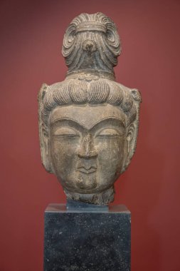 Paris, France - 07 20 2024: Cernuschi museum. Bodhisattva head, sandstone, Tang, China clipart