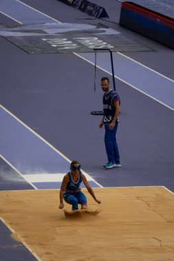 Paris, France - 08 30 2024: Olympic Games Paris 2024. View of women's long jump T11 final round in the stadium during The Paralympic Athletics events clipart