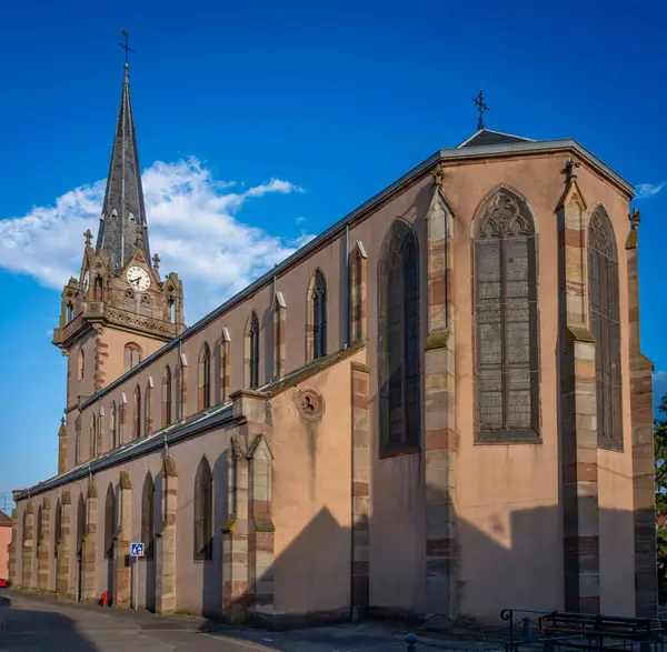 stock image Bernardswiller, France - 09 02 2024: Church of Bernardswiller. Panoramic exterior view of the rear facade of the church