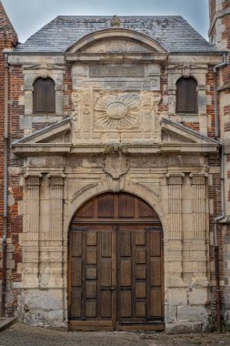 Eu, France - 09 21 2024:  View of the facade and stone entrance of Chapel of the Jesuit College building clipart