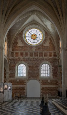 Eu, France - 09 21 2024:  View inside the Chapel of the Jesuit College building with stained glass window clipart