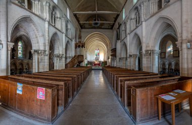 Gamaches, France - 09 21 2024:  View inside the Church of Saint Peter and Saint Paul from the nave clipart