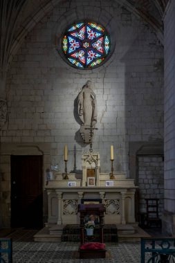 Gamaches, France - 09 21 2024:  View inside the Church of Saint Peter and Saint Paul of a chapel clipart