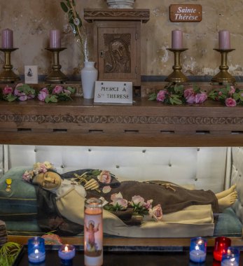 Berck, France - 09 20 2024:  View inside Saint John Church of Saint Therese statue lying clipart