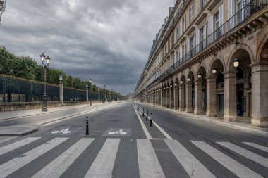 Paris, France - 11 01 2024: View of Rivoli Street at sunset with few people clipart