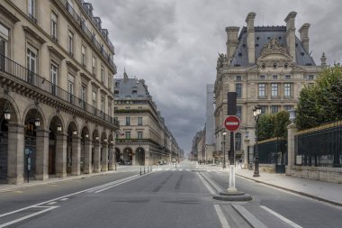 Paris, France - 11 01 2024: View of Rivoli Street at sunset with few people clipart