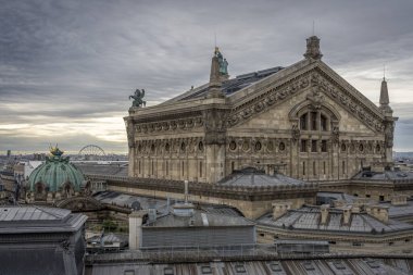 Paris, France - 11 23 2024: Boulevard Haussmann. Panoramic view of Paris, Boulevard Haussmann and the rear facade of the Opera Garnier from Galeries Lafayette Paris Haussmann roof terrace at christmas clipart