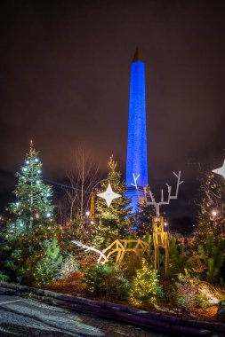 Paris, France - 12 18 2024: View The Paris Christmas Market on Place de la Concorde at Christmas night clipart