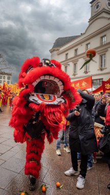 Aubervilliers, France - 02 05 2022: Chinese New Year. Festivities for the Year of the wood snake in the Aubervilliers district clipart