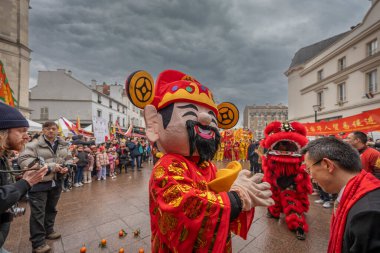 Aubervilliers, France - 02 05 2022: Chinese New Year. Festivities for the Year of the wood snake in the Aubervilliers district clipart