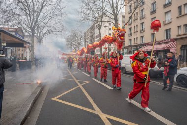 Aubervilliers, France - 02 05 2022: Chinese New Year. Festivities for the Year of the wood snake in the Aubervilliers district clipart