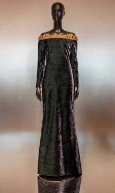 Paris, France - 03 01 2025: Le Louvre Couture. Yves Saint Laurent. Evening dress, shot velvet composed of viscose polyamide and cotton clipart