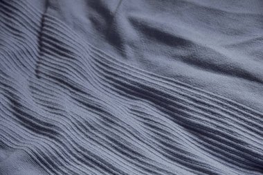 The texture of the fabric is pale blue.