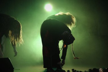 Girls dancing light music, bow. 