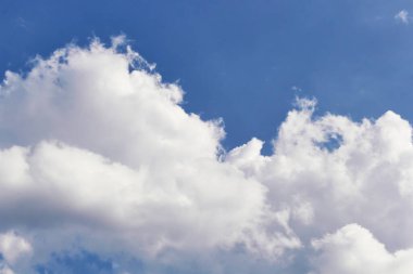Blue sky and white clouds. Beautiful sky background.