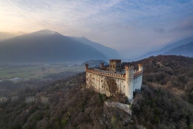 Aerial view of the castle of Montalto Dora on Craver Mount in winter. Ivrea, Piedmont, Italy clipart