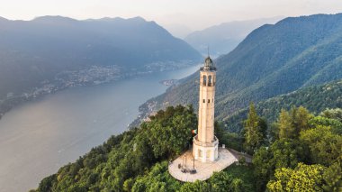 Aerial view of the Faro Voltiano Volta Lighthouse in Brunate, Como lake, Como province, Lombardy, Italy  clipart