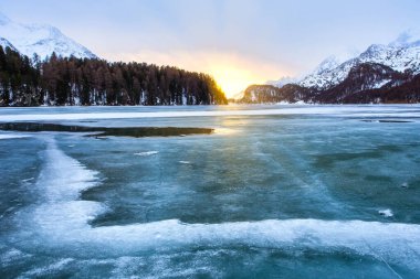Frozen lake with mountain landscape in Silvaplana, Engadine, Switzerland.
