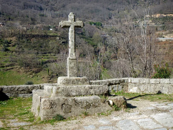 Stone cross on the Roman road of the Via of Silver