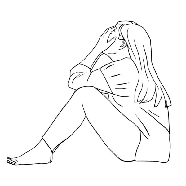 Üzgün kadın elleriyle gözlerini kapatıyor.