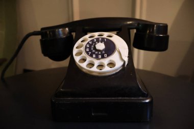 Vintage Rotary Dial Telephone in Black with Cyrillic Letters clipart