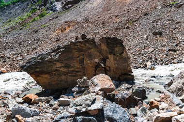 Sunny day in Georgia.Mestiachala river in August.Stones in the river.